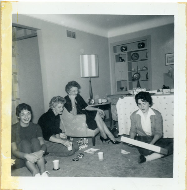 Suzanne Stratman opening gifts, 1961 